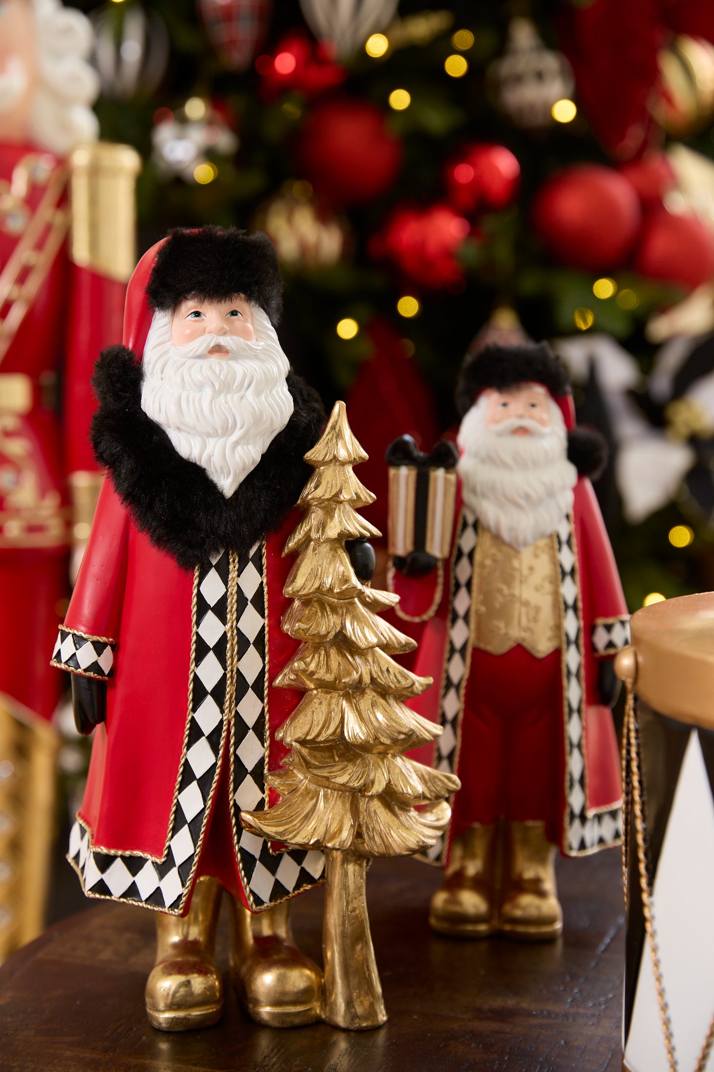 30 CM HARLEQUIN SANTA WITH GIFT