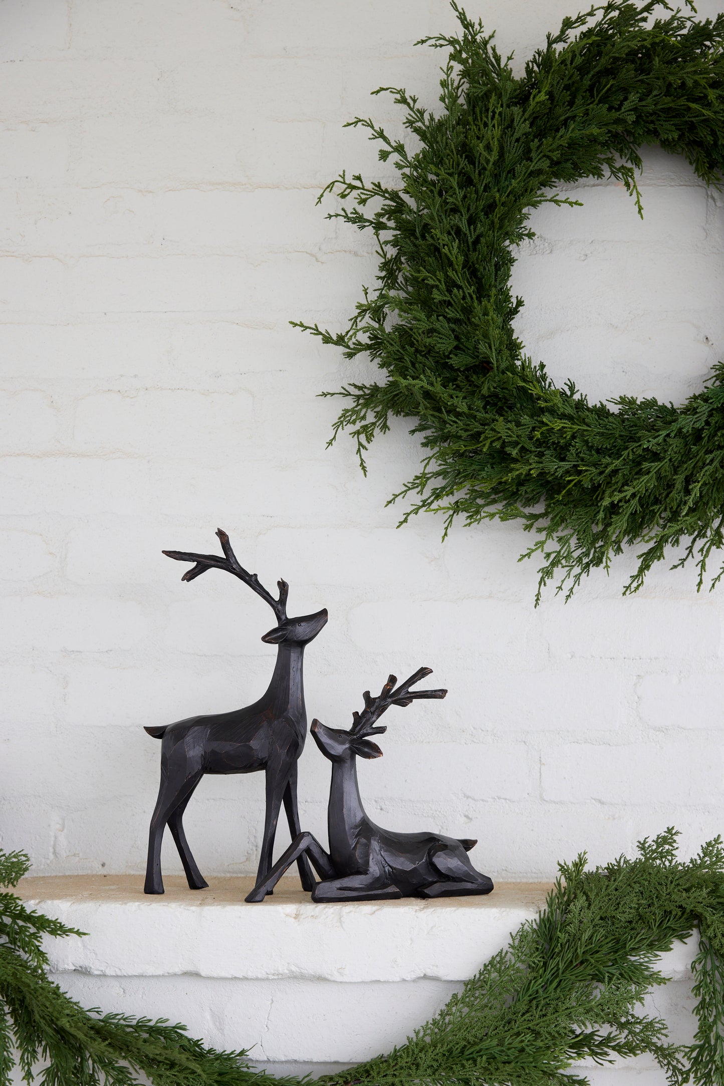 26 CM WOOD CARVED SITTING REINDEER