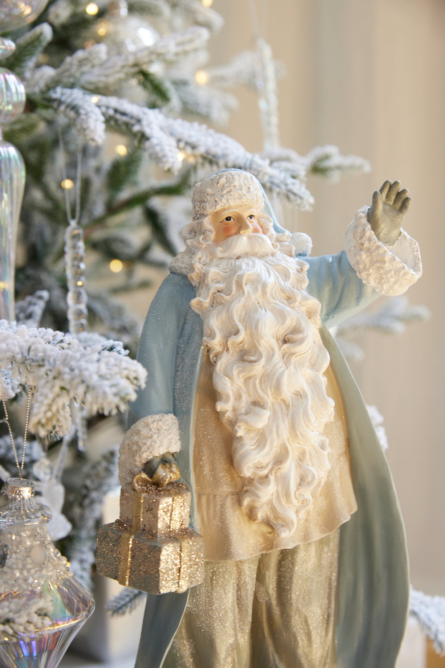 Snowy Blue Waving Santa