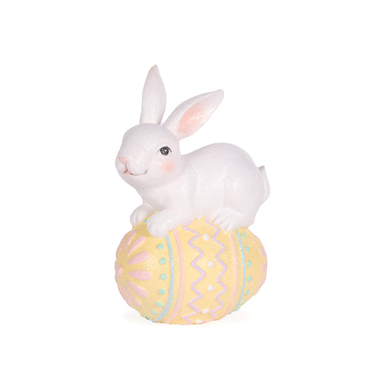 RABBIT BALANCING ON PASTEL EGG