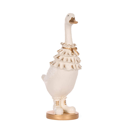IVORY AND GOLD REGAL DUCK WITH CAPE