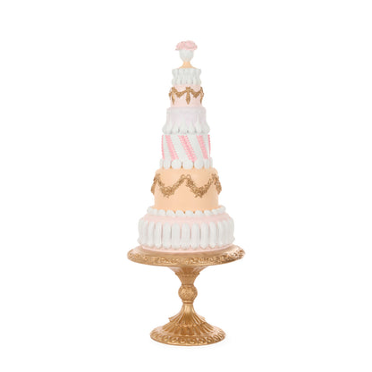 ELABORATE PIPED PASTEL CAKE ON PEDESTAL